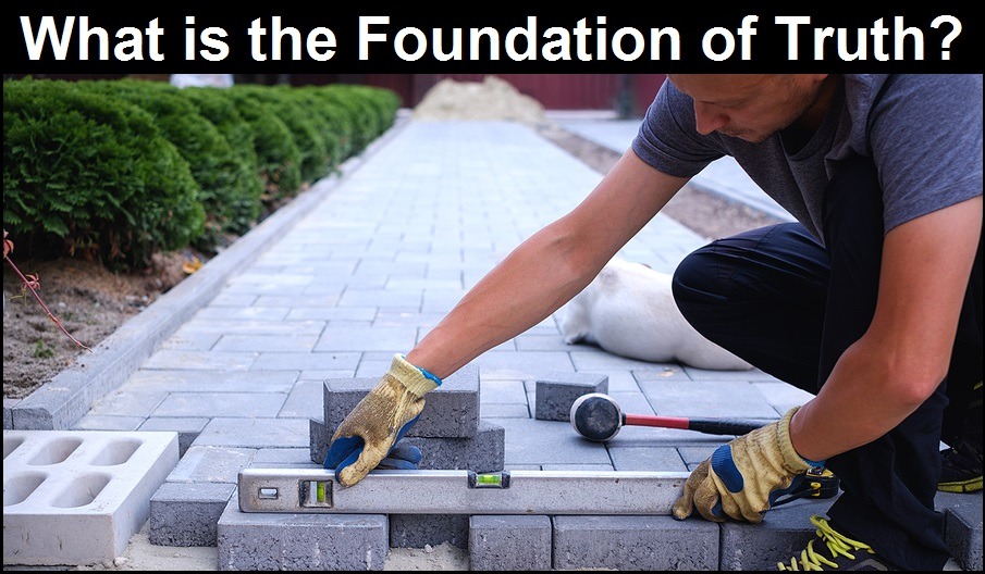 The master in yellow gloves lays paving stones in layers. Garden